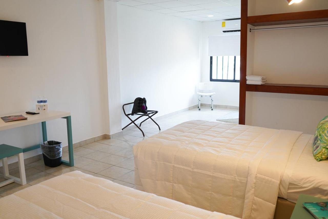 Hotel & Suites Arges - Centro เชตุมัล ภายนอก รูปภาพ